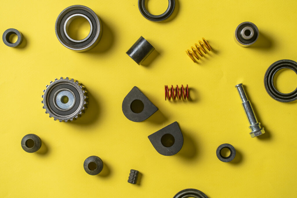 a new car spare parts flat lay, pieces for automobile engine repair, flat lay