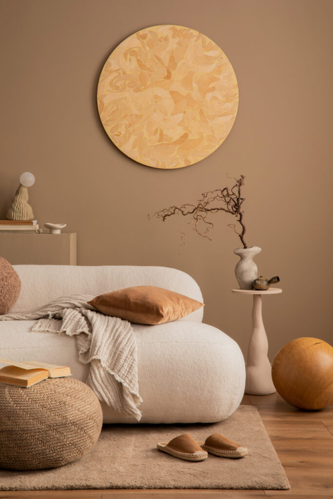 Warm and cozy living room interior with round wall panel, stylis